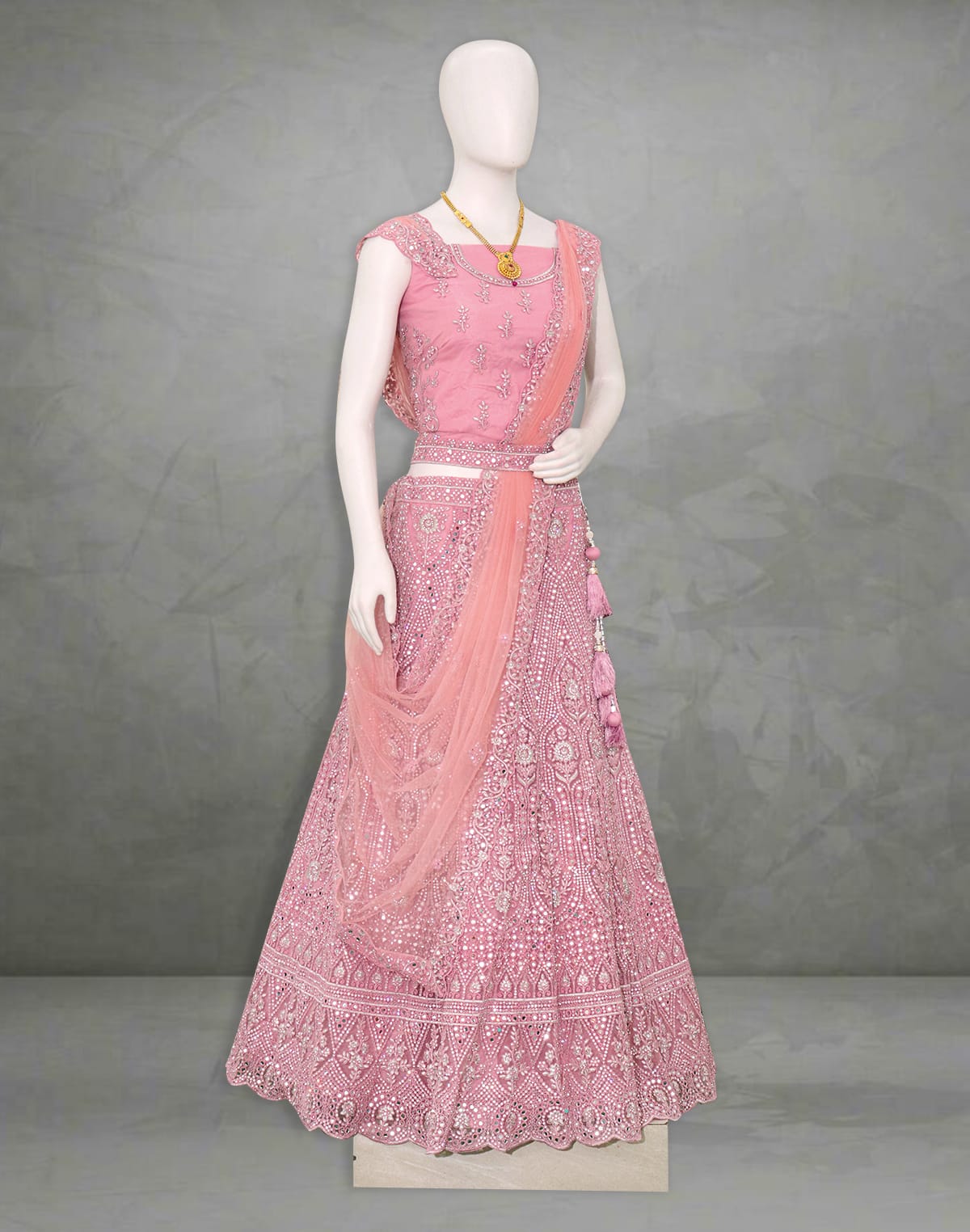 Collection of Designer party wear Light Pink all over Mirror work fully flared Netted Half Saree with Belt in a gallery layout