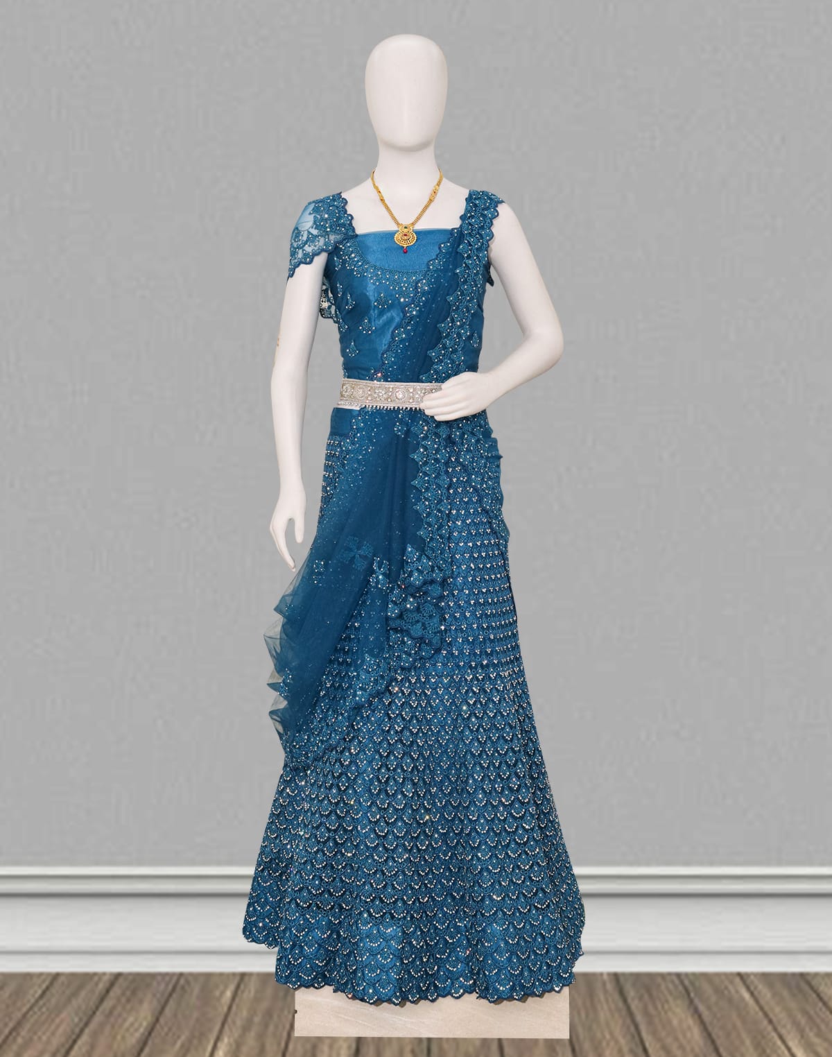 Traditional party wear Peacock Blue floral stones work Netted fabric lehenga set