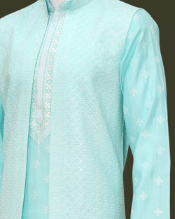 Collection of Elegant Firozi Raw Sill Floral Design Kurta Jacket Set in a gallery layout