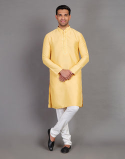 Collection of Simple Yellow Coloured Plain Soft Silk Kurta Pajama in a gallery layout