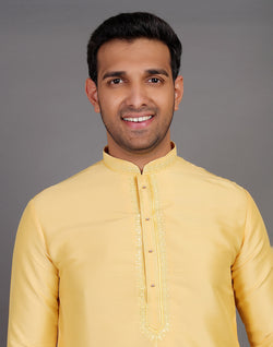 Collection of Simple Yellow Coloured Plain Soft Silk Kurta Pajama in a gallery layout