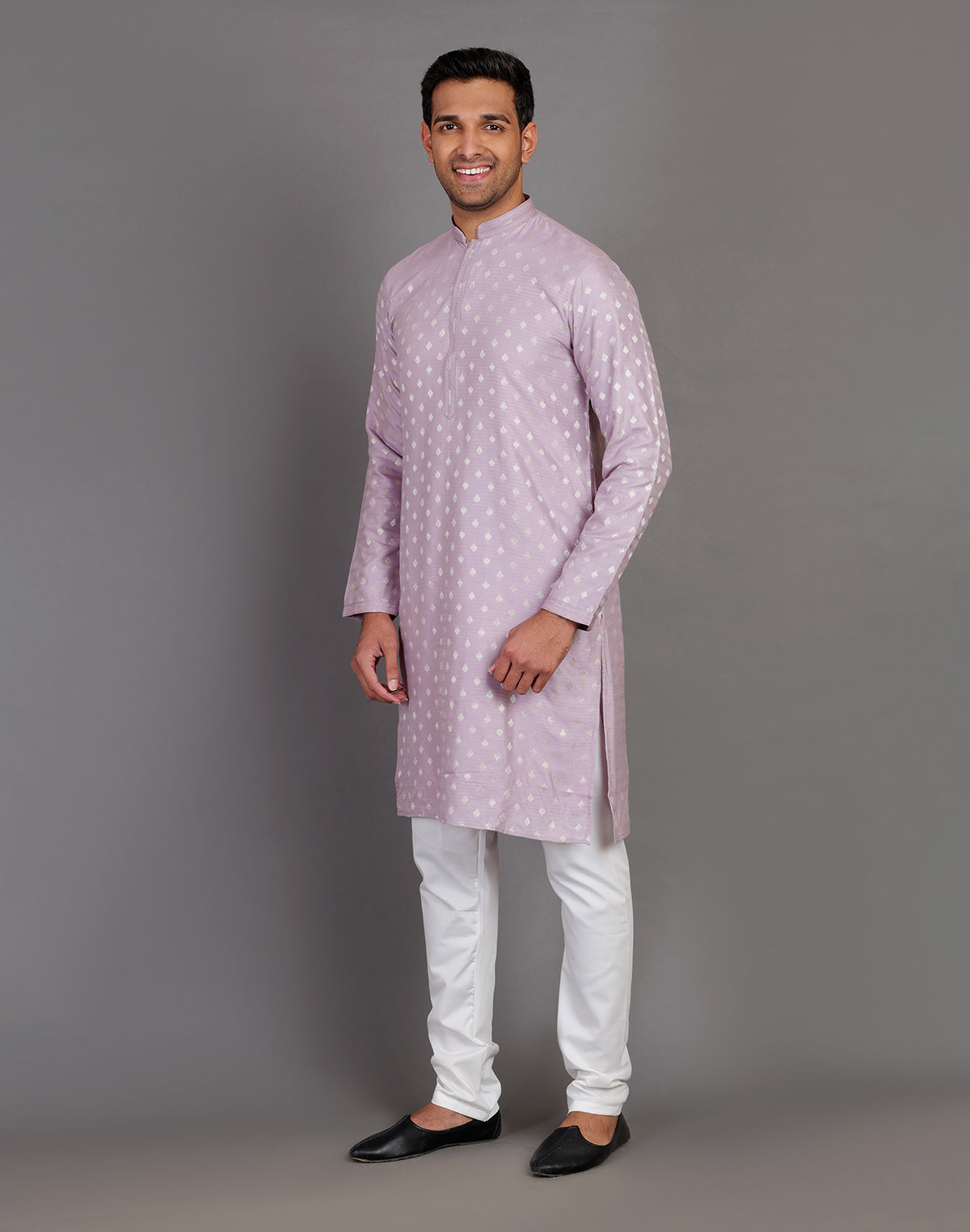 Collection of Soft Silk Lavender Coloured All Over Silver Bootis Kurta Pyjama Set in a gallery layout