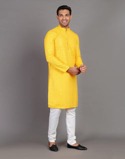 Collection of Self Thread and Sequence Design Yellow Georgette Kurta Pyjama Set in a gallery layout