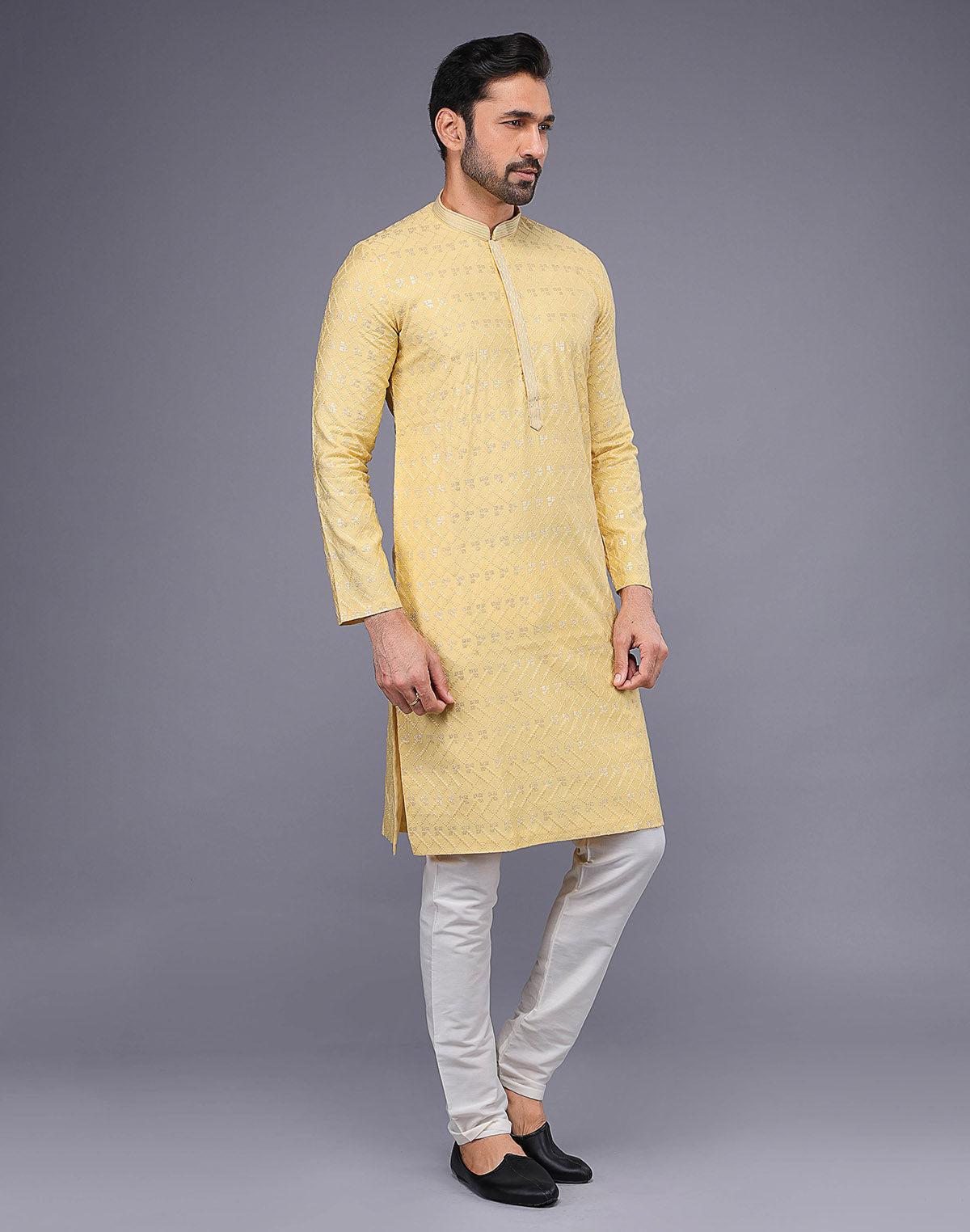 Collection of Elegant Yellow Embellished With Thread Work Kurta Pyjama Set in a gallery layout