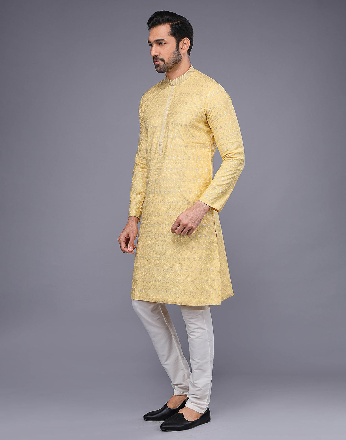 Collection of Elegant Yellow Embellished With Thread Work Kurta Pyjama Set in a gallery layout