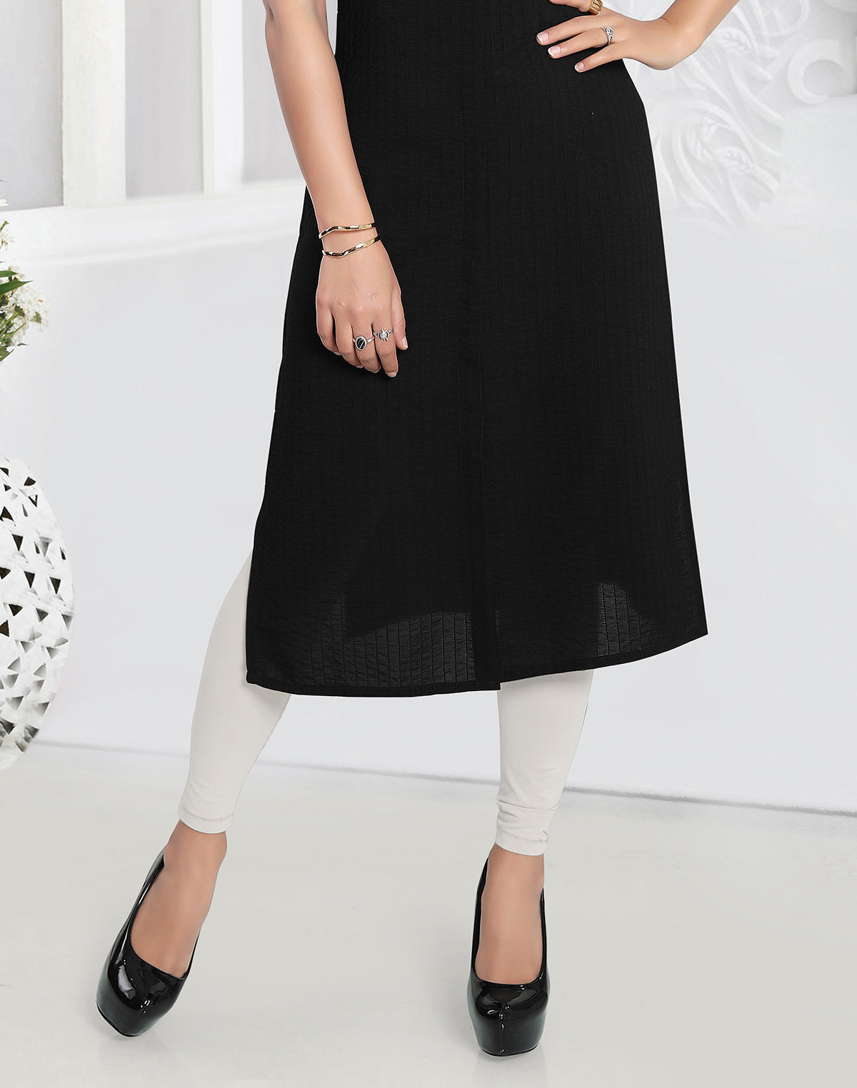 Collection of Black Cotton Silk Kurti in a gallery layout