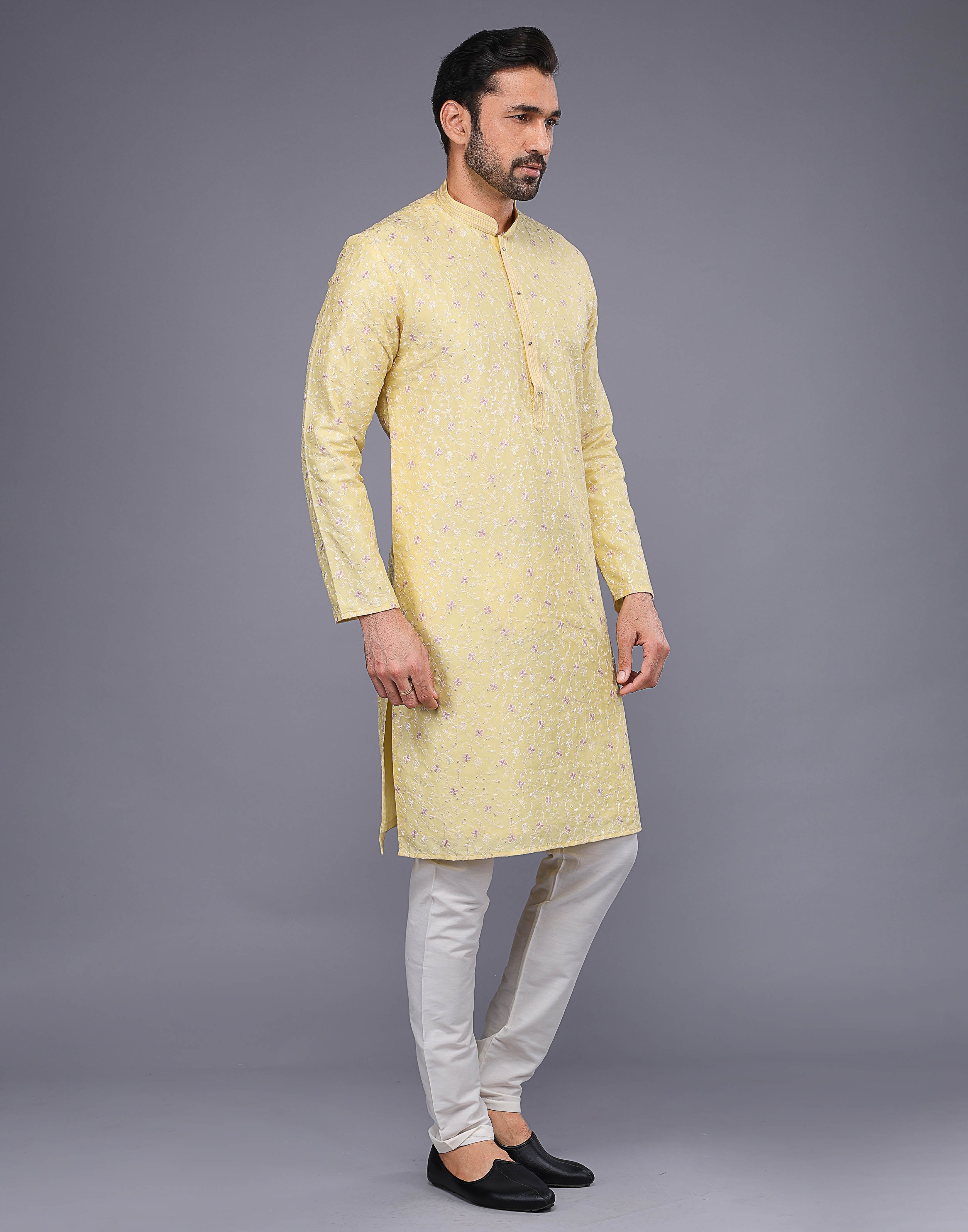 Collection of Yellow Color Floral Design Thread Embroidery Work Kurta Set in a gallery layout