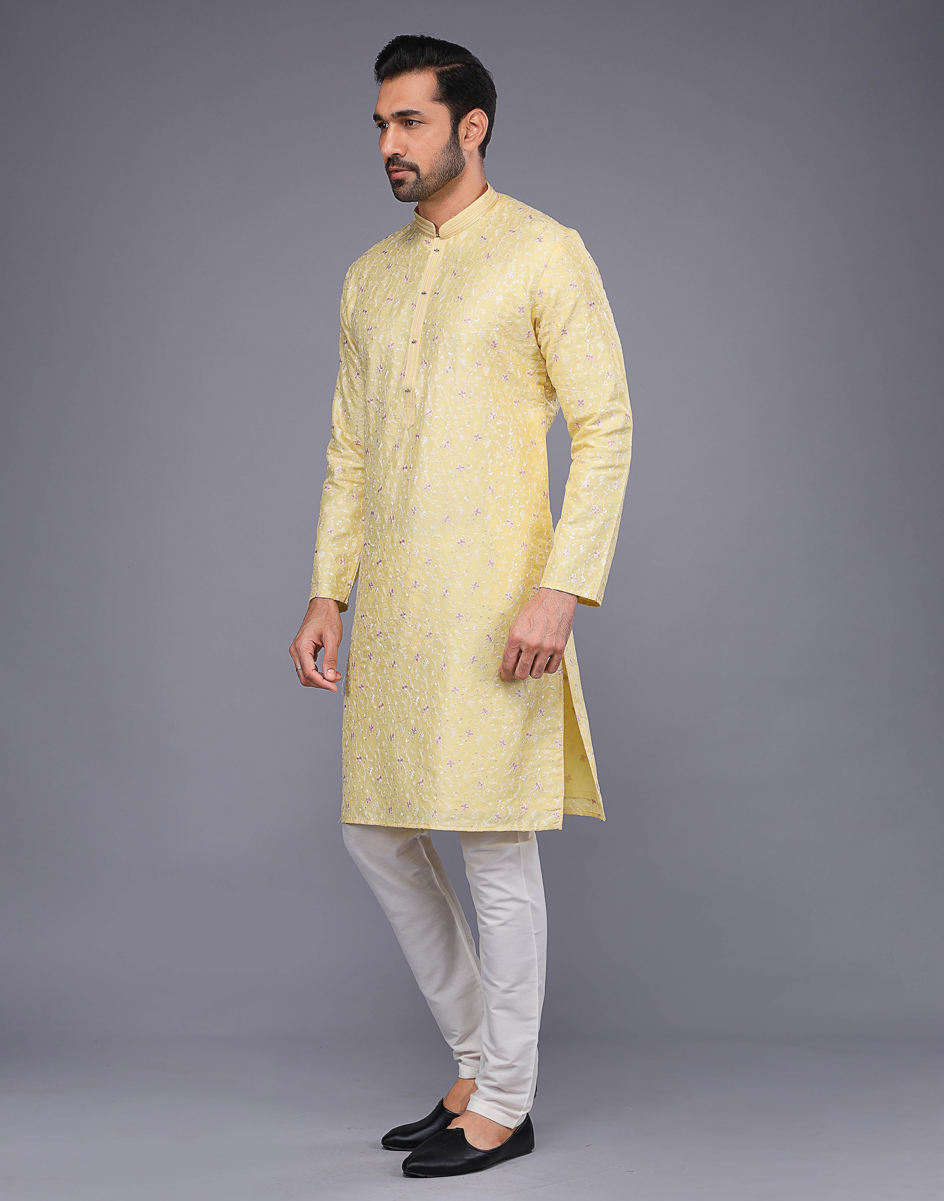 Collection of Yellow Color Floral Design Thread Embroidery Work Kurta Set in a gallery layout