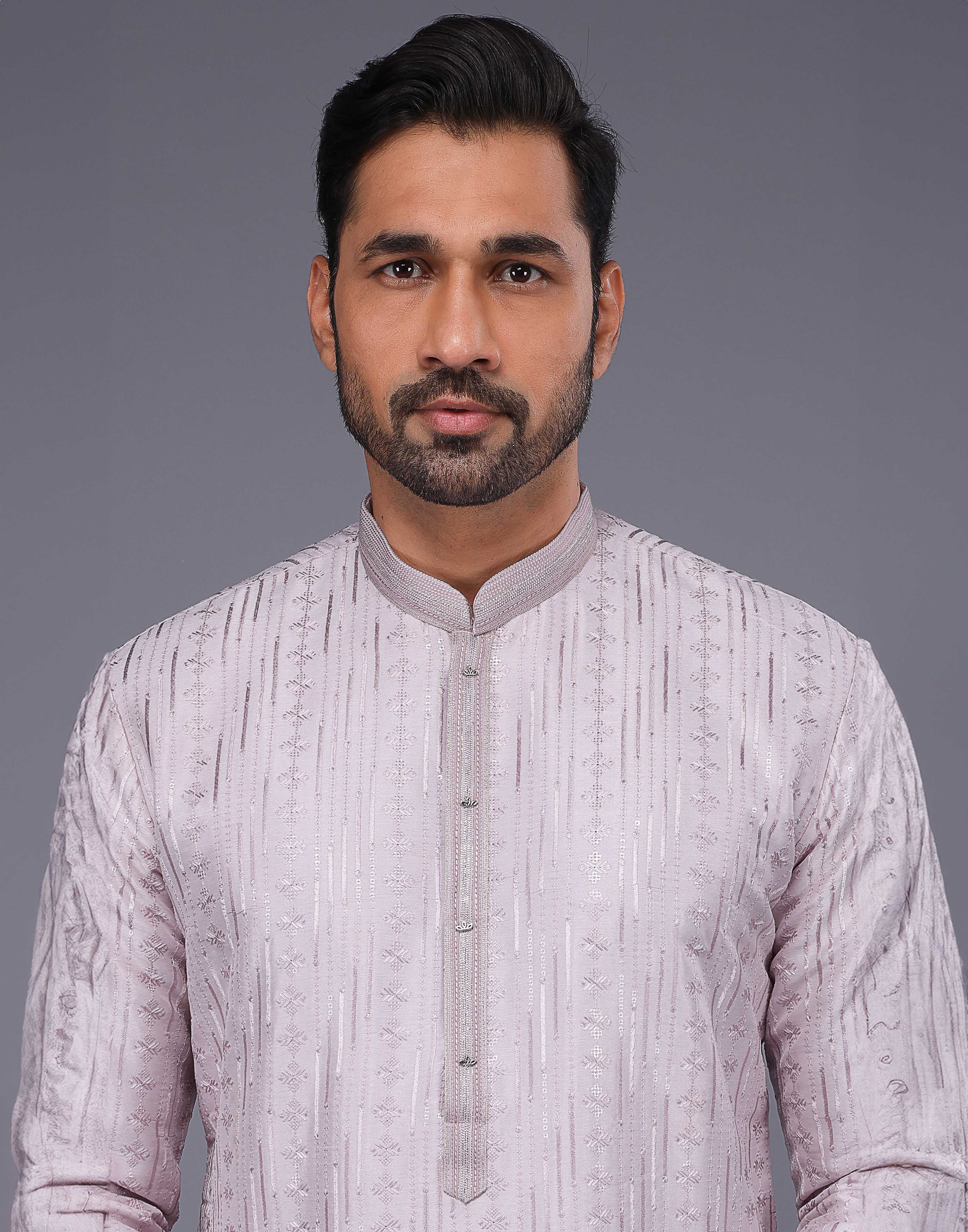 Collection of Lavender Self Floral Embroidery With Embellished Work Kurta Set in a gallery layout