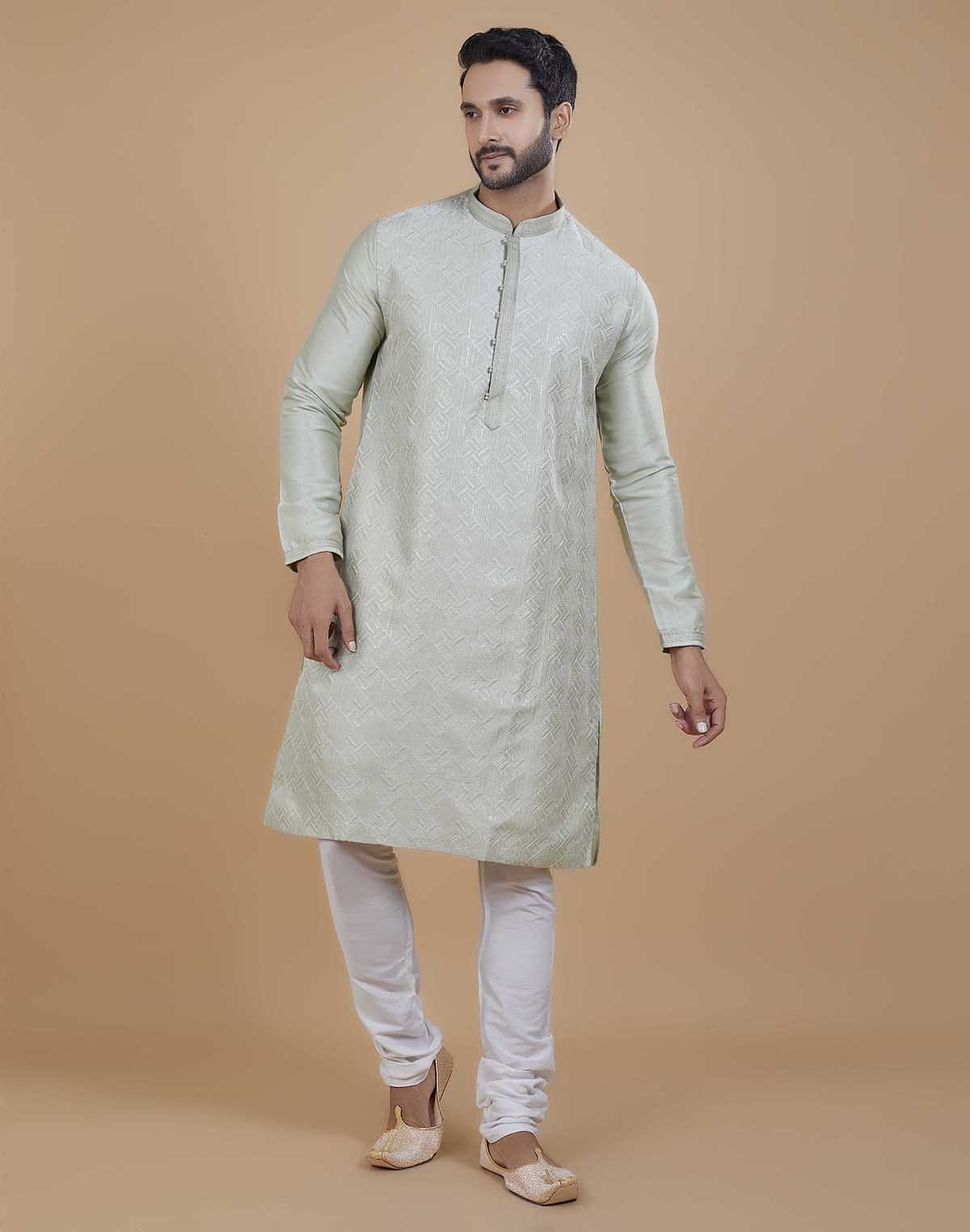 Collection of Soft Silk Self Design Pattern Kurta Set in a gallery layout