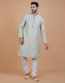 Collection of Soft Silk Self Design Pattern Kurta Set in a gallery layout