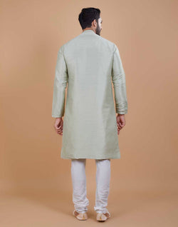 Collection of Soft Silk Self Design Pattern Kurta Set in a gallery layout