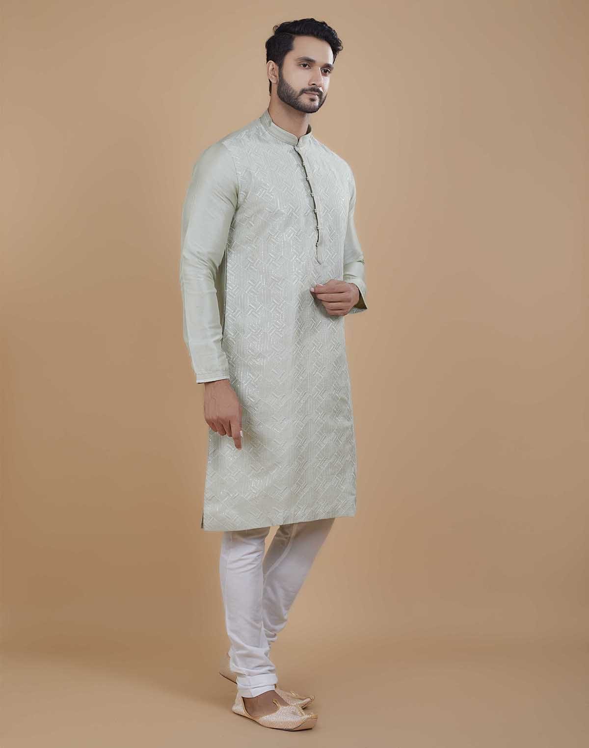 Collection of Soft Silk Self Design Pattern Kurta Set in a gallery layout