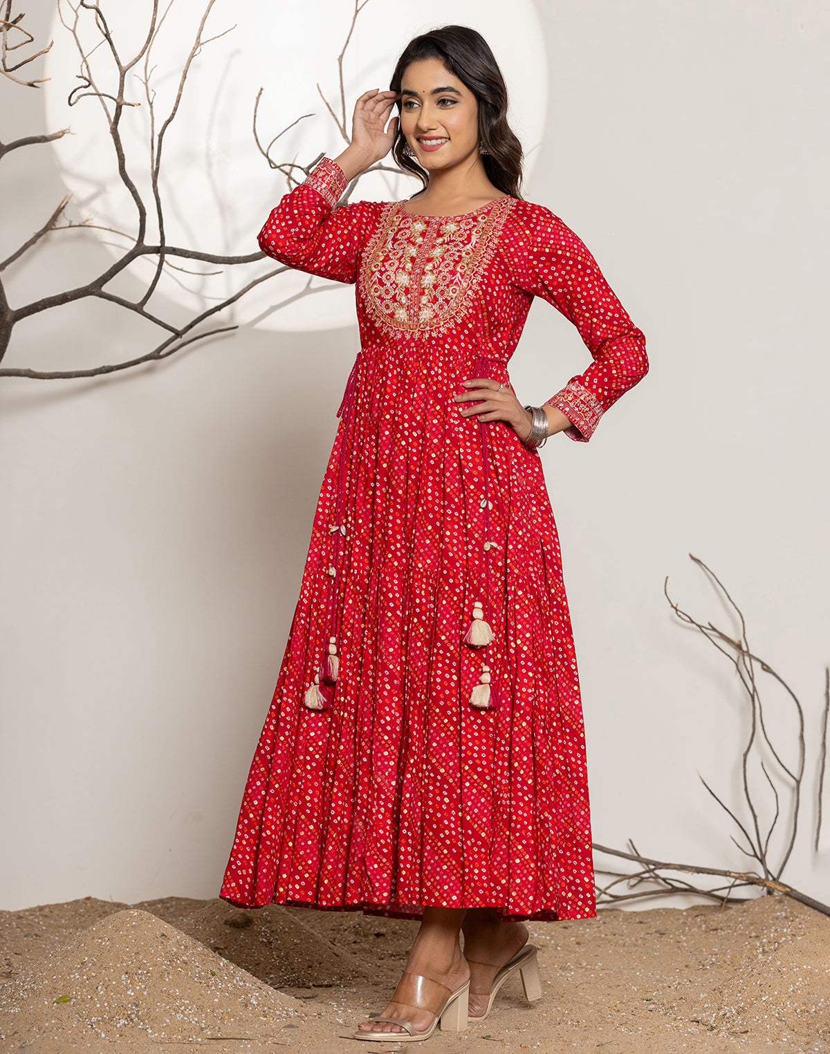 Collection of Red Bandhini Print Rayon Party Wear Kurti in a gallery layout