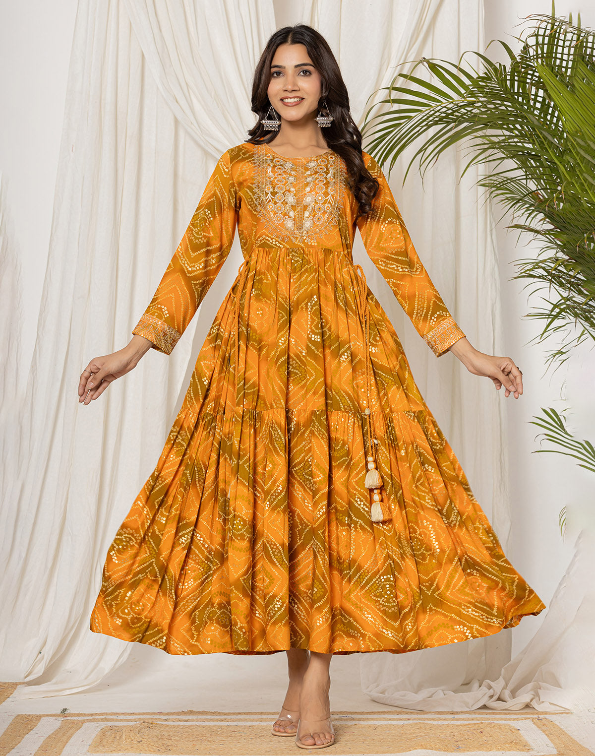 Collection of Mustard Rayon Bandhini Print Kurti in Round Neck in a gallery layout