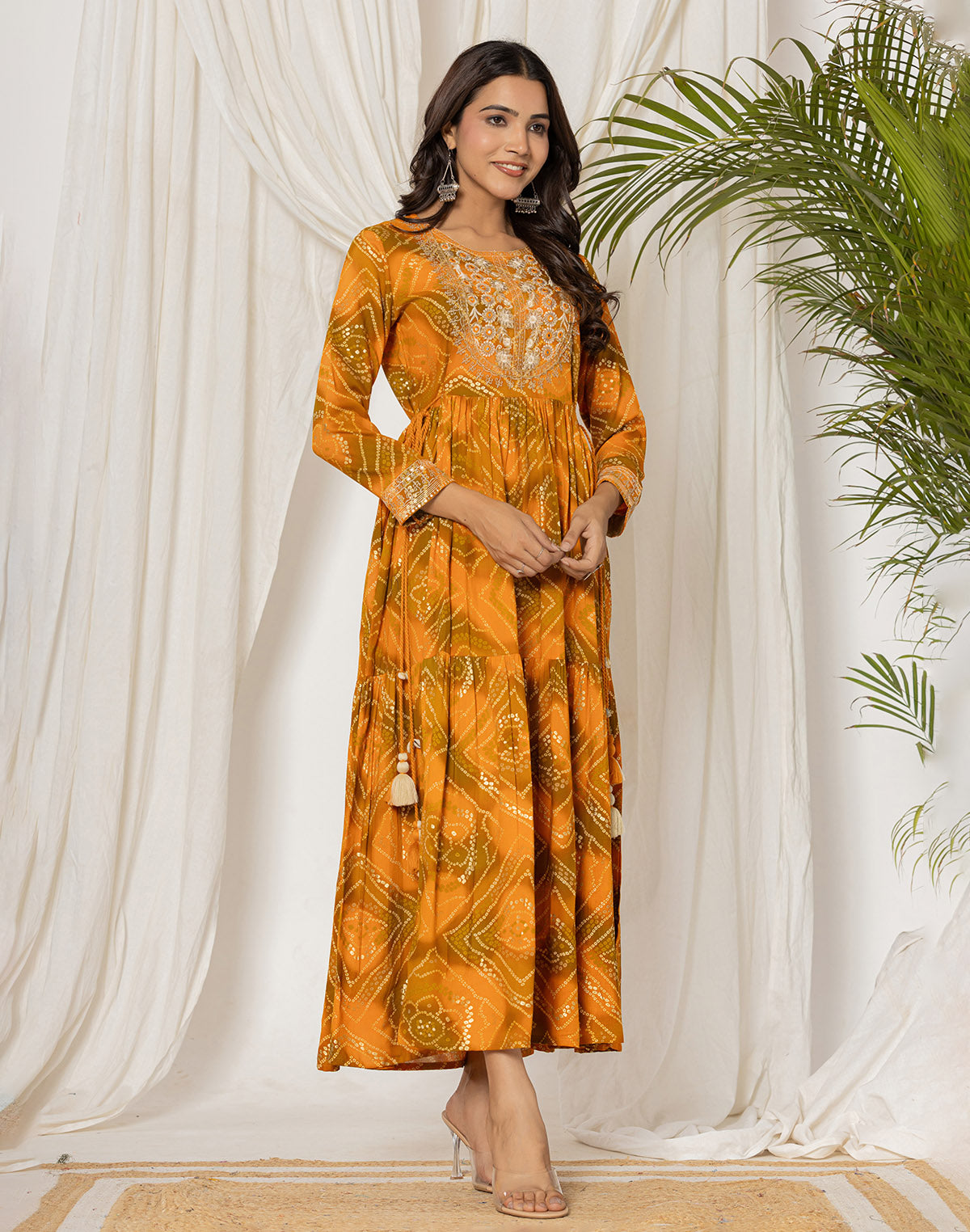 Collection of Mustard Rayon Bandhini Print Kurti in Round Neck in a gallery layout