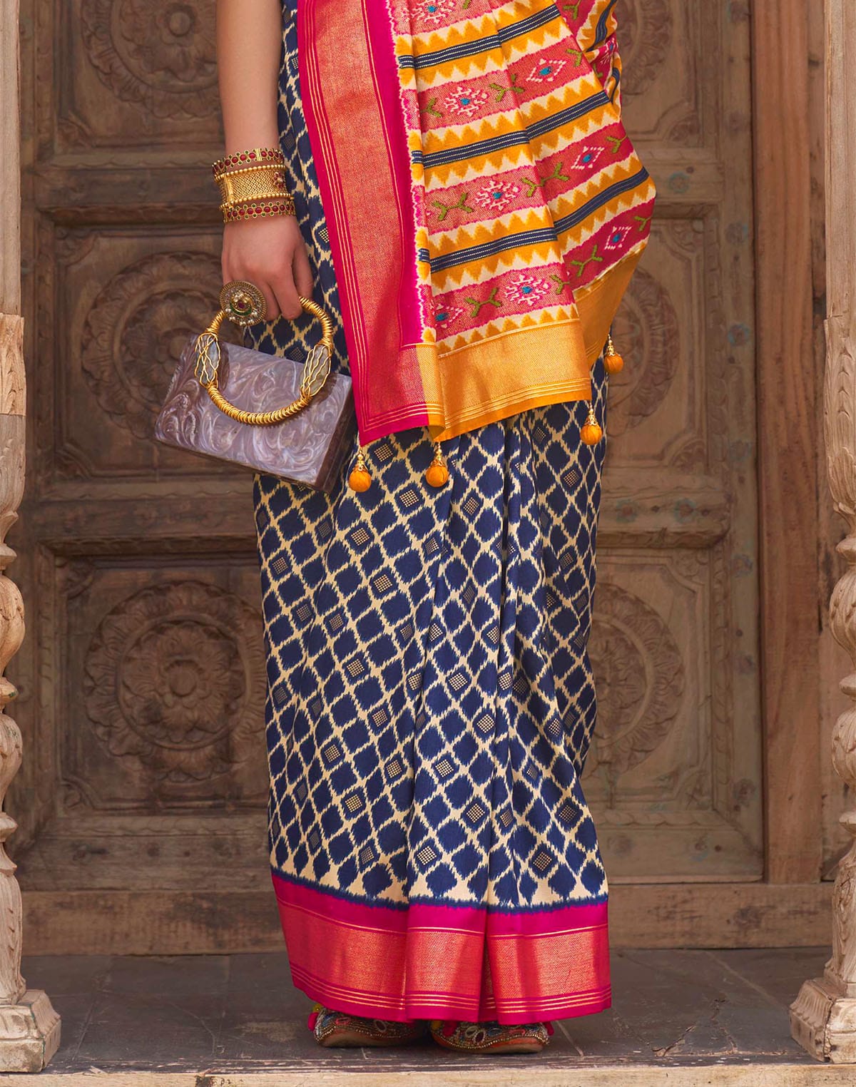 Collection of Blue Patola Silk Saree with Contrast Blouse in a gallery layout