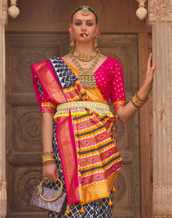 Collection of Blue Patola Silk Saree with Contrast Blouse in a gallery layout