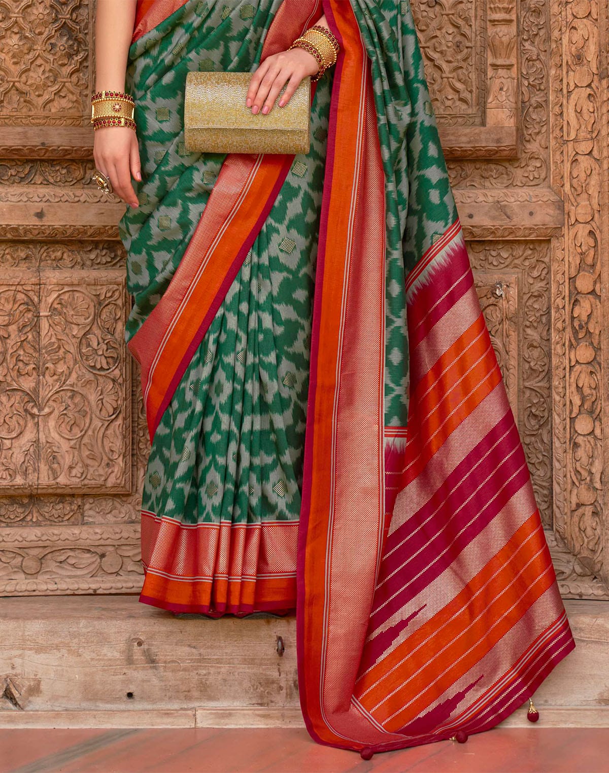 Collection of Dark Green and Maroon Patola Saree in a gallery layout