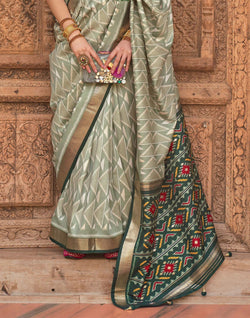 Collection of Light Green Geometric Print Patola Designer Saree in a gallery layout