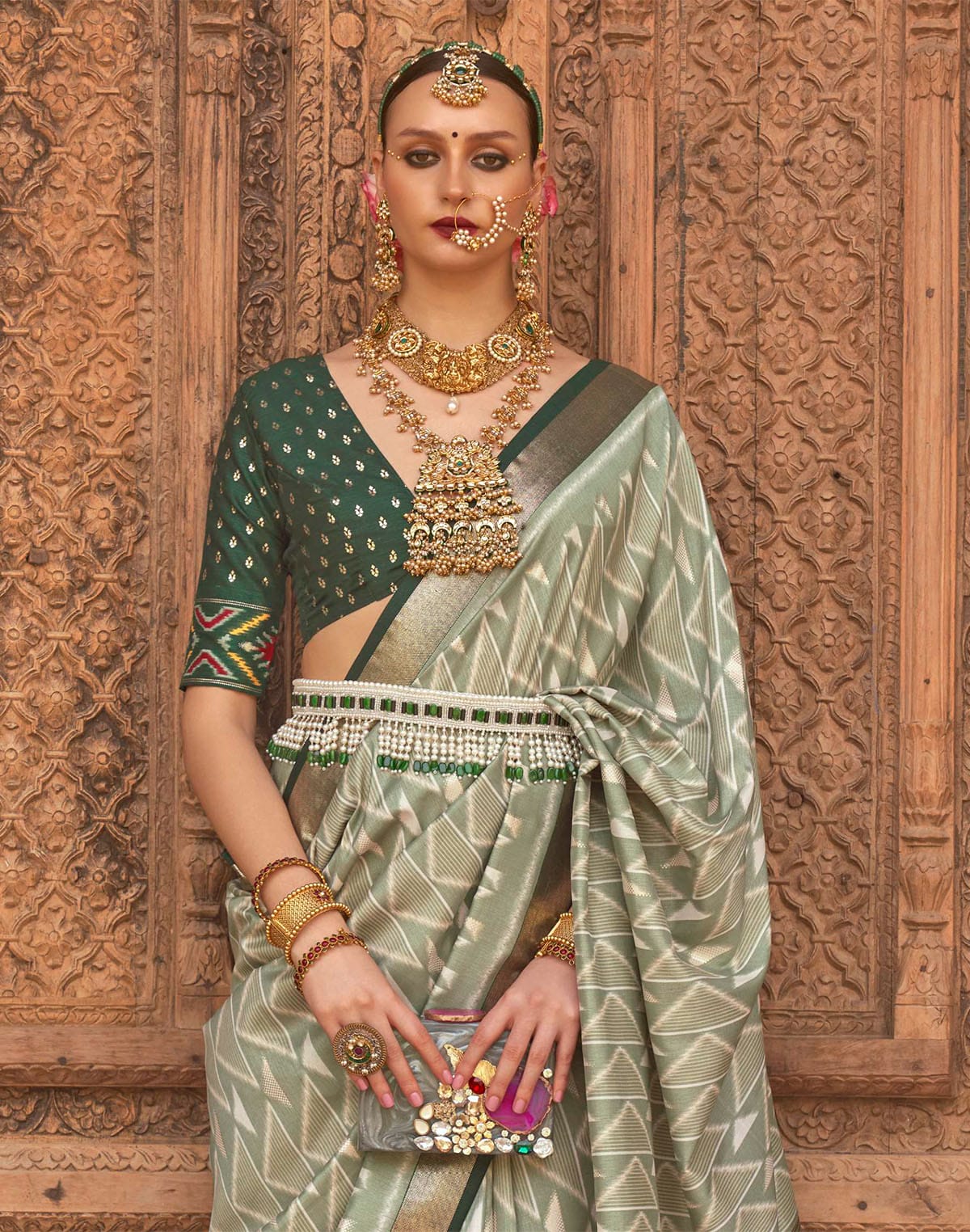 Collection of Light Green Geometric Print Patola Designer Saree in a gallery layout