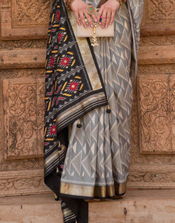 Collection of Grey and Black Patola Printed Saree in a gallery layout