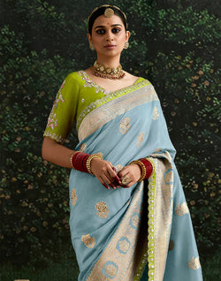 Collection of Light Blue Pure Dola Silk Lace Border Saree With Contrast Work Blouse in a gallery layout