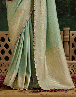 Collection of Light Pista Green Dola Silk Woven Saree With Embroidery Work Blouse in a gallery layout