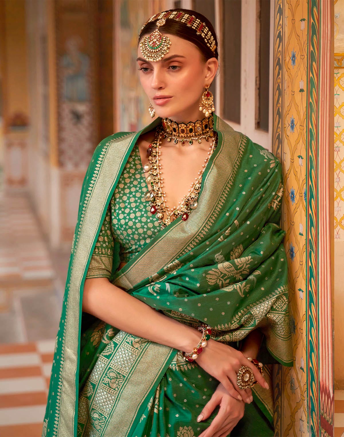 Collection of Green Coloured Smooth Banaras Silk Woven design Saree in a gallery layout