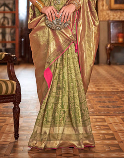 Collection of Olive Green Banaras Silk Trendy Saree in a gallery layout