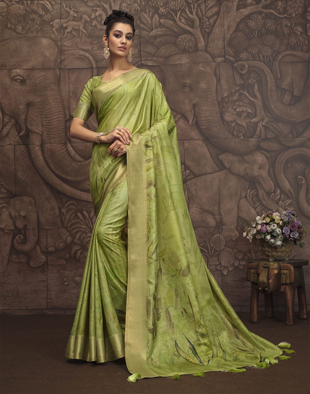 Collection of Stylish Parrot Green Graphic Design Malai Silk Saree in a gallery layout