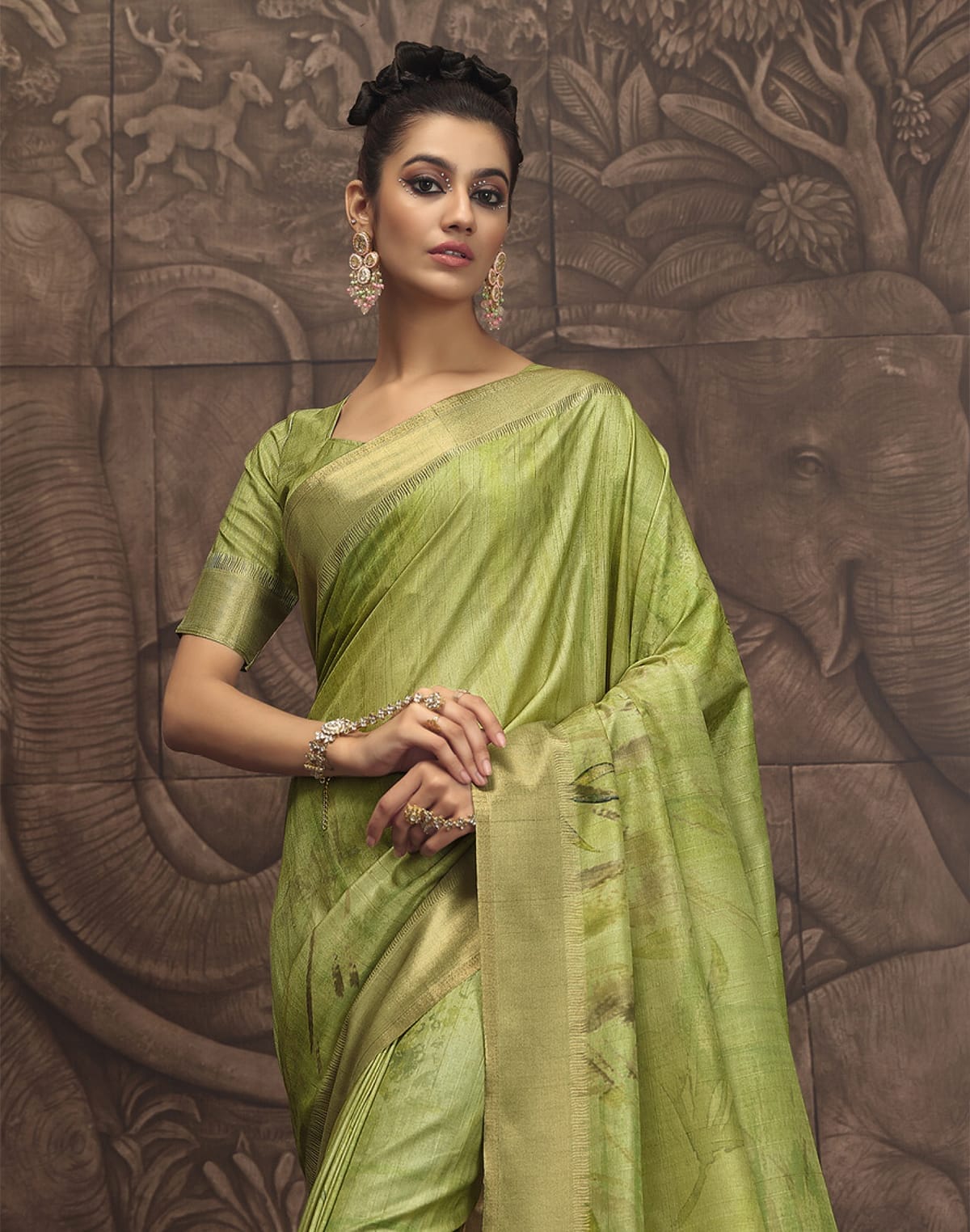 Collection of Stylish Parrot Green Graphic Design Malai Silk Saree in a gallery layout