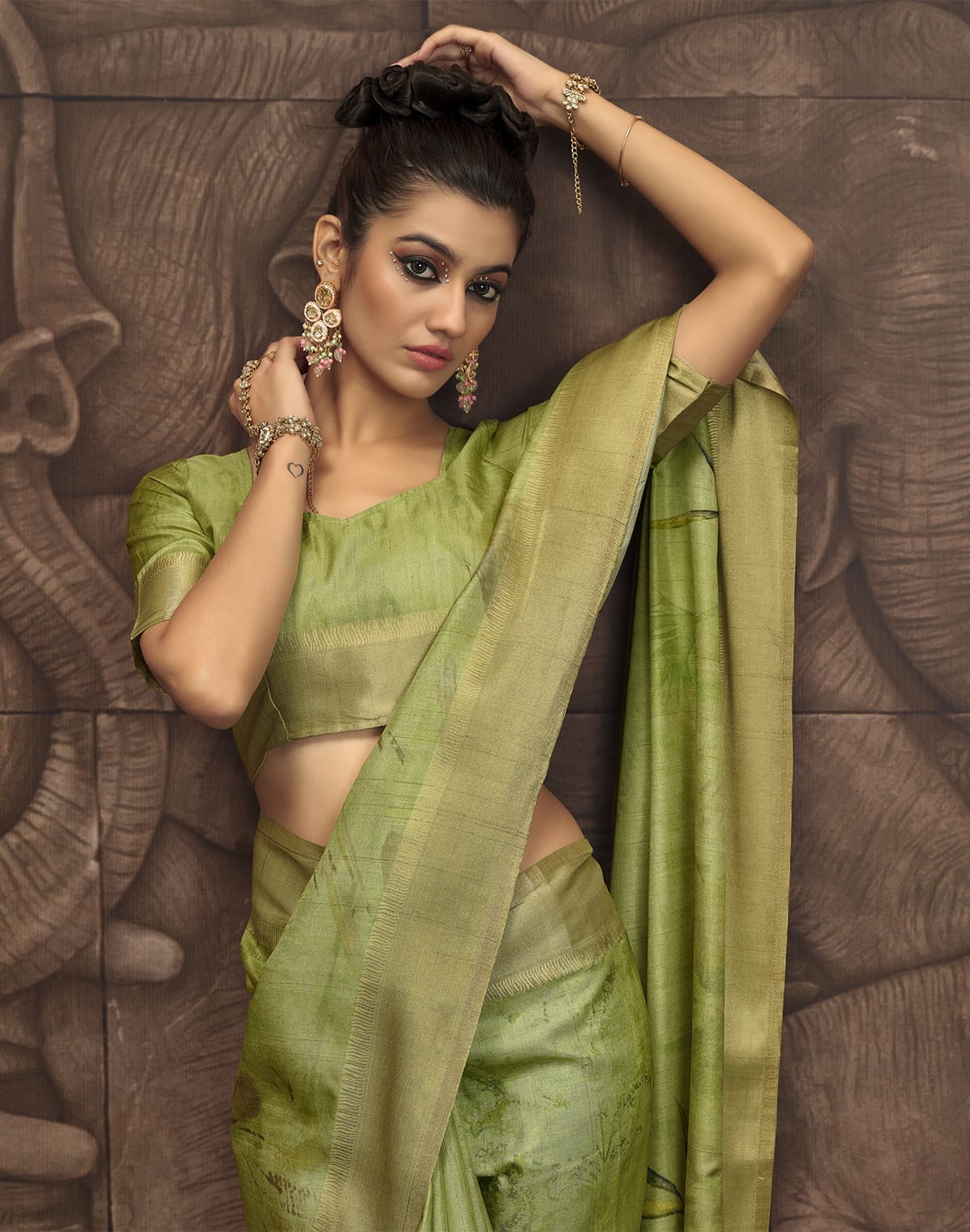 Collection of Stylish Parrot Green Graphic Design Malai Silk Saree in a gallery layout