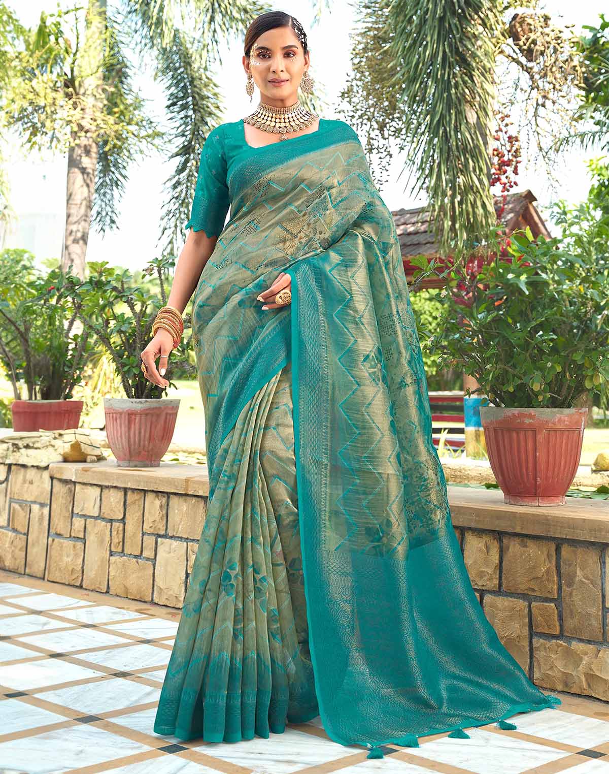 Collection of Sea Green Chevron Pattern Tissue Saree in a gallery layout