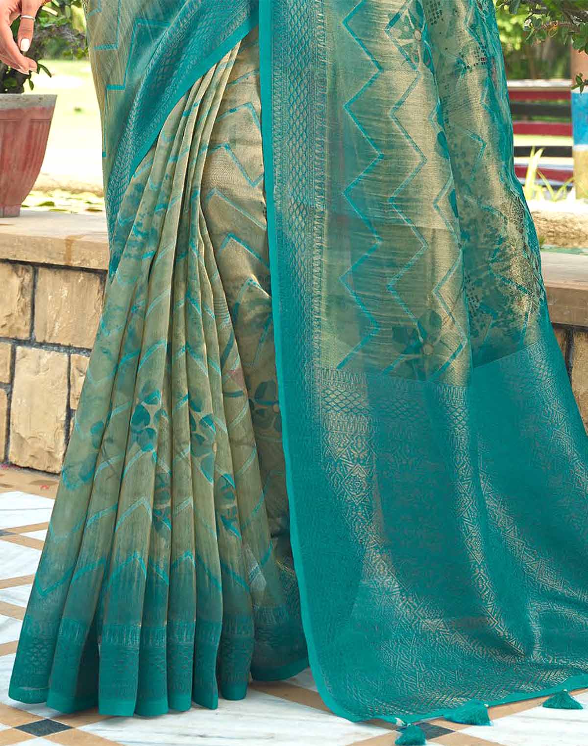 Collection of Sea Green Chevron Pattern Tissue Saree in a gallery layout