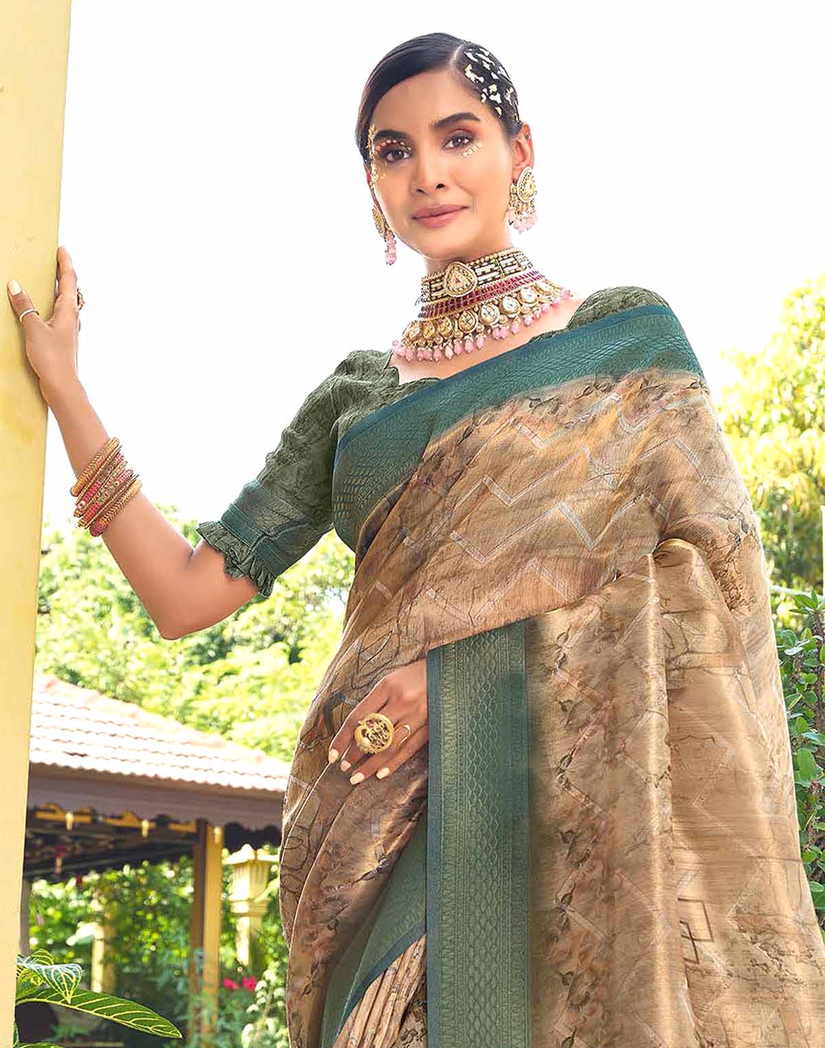 Collection of Light Orange Chevron Tissue Contrast Border Saree in a gallery layout