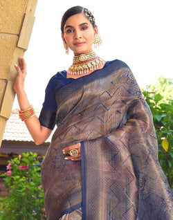 Collection of Blue Soft Tissue Saree with Unstitched Blouse in a gallery layout