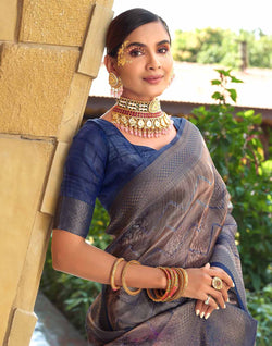 Collection of Blue Soft Tissue Saree with Unstitched Blouse in a gallery layout