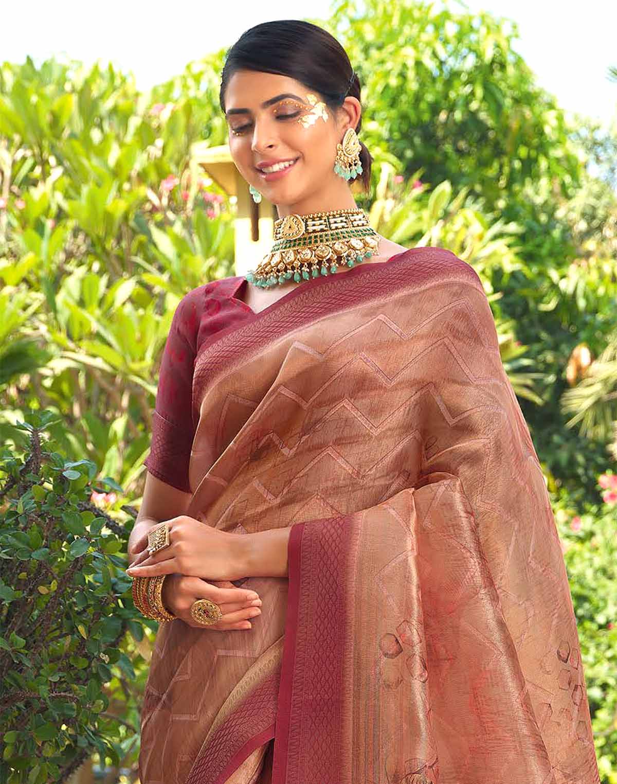 Collection of Orange Shaded Tissue Fancy Saree in a gallery layout