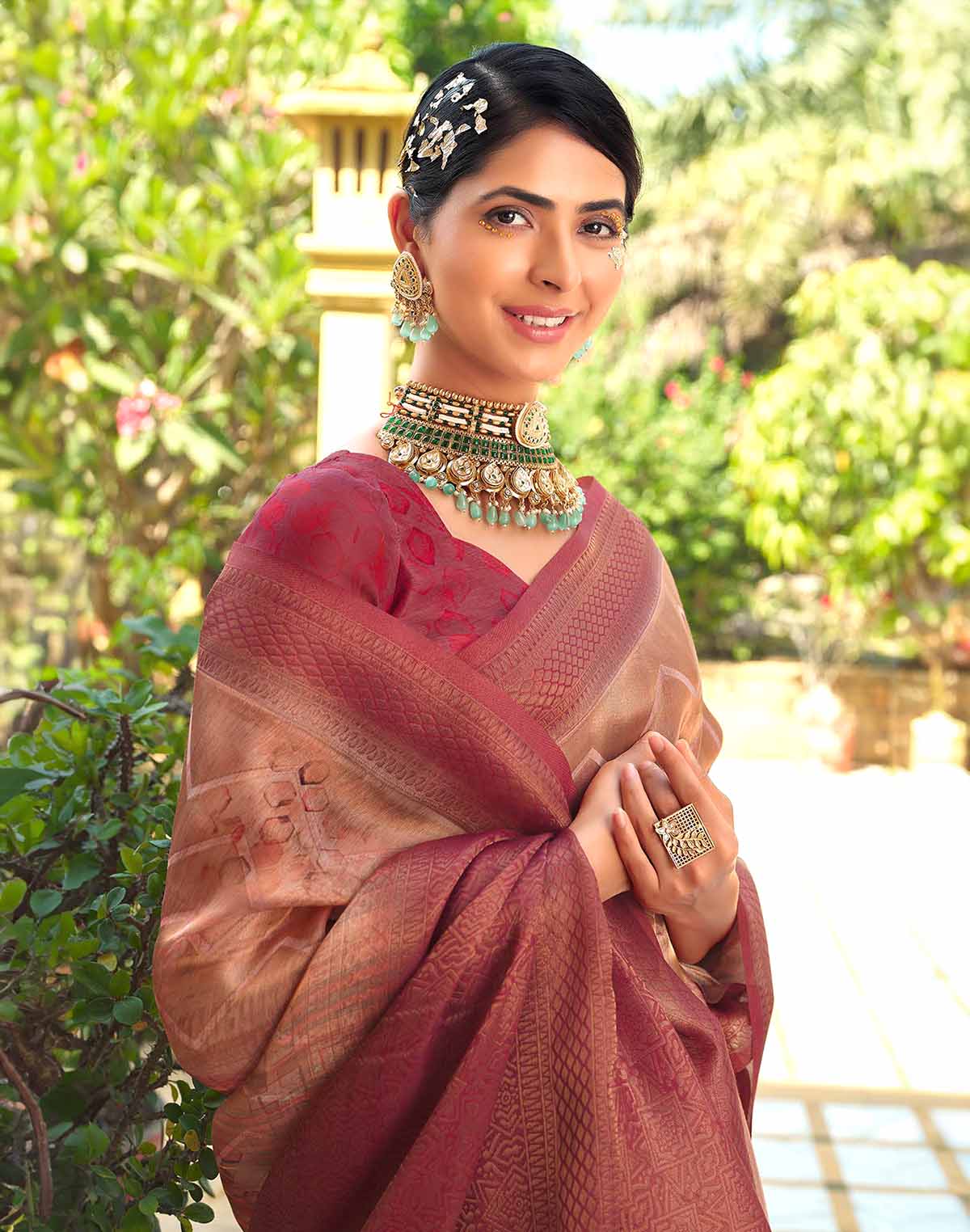 Collection of Orange Shaded Tissue Fancy Saree in a gallery layout