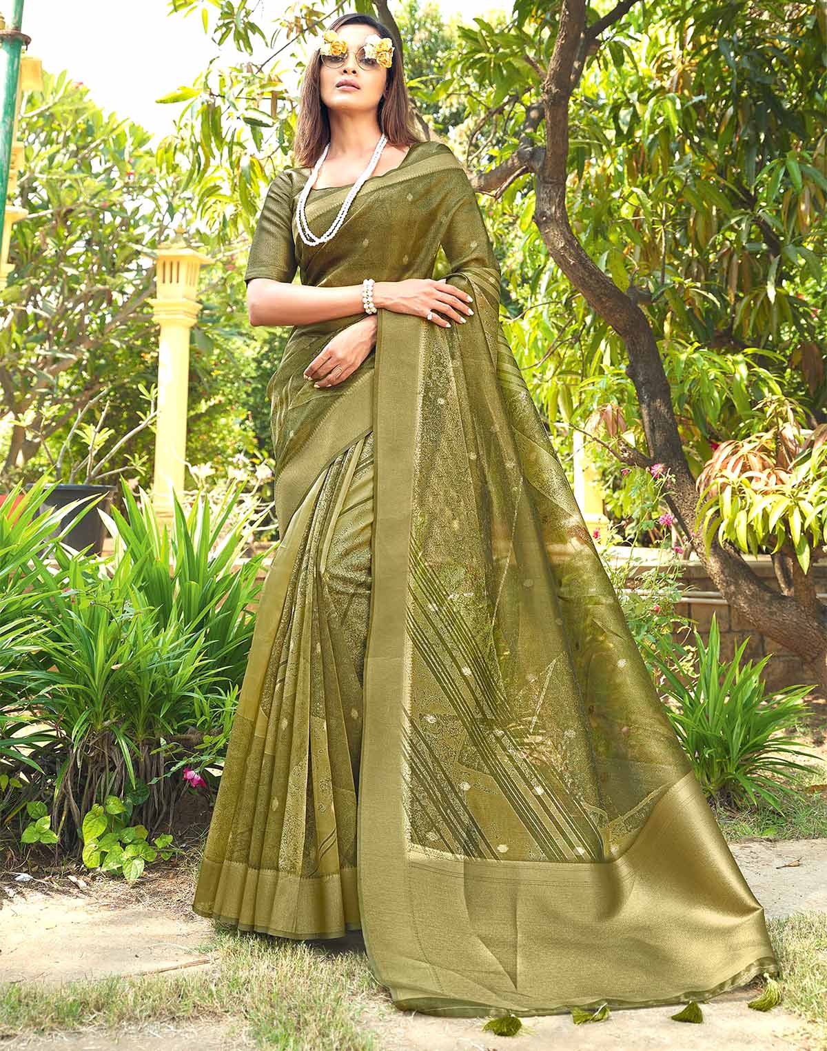 Collection of Adorable Green Organza Designer Saree in a gallery layout