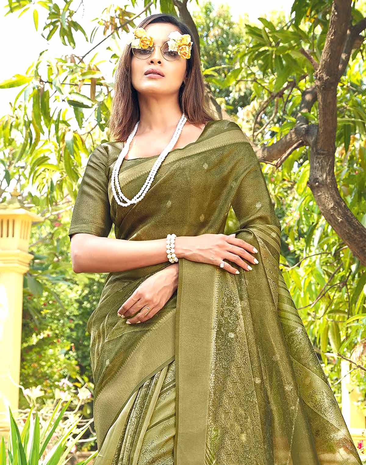 Collection of Adorable Green Organza Designer Saree in a gallery layout