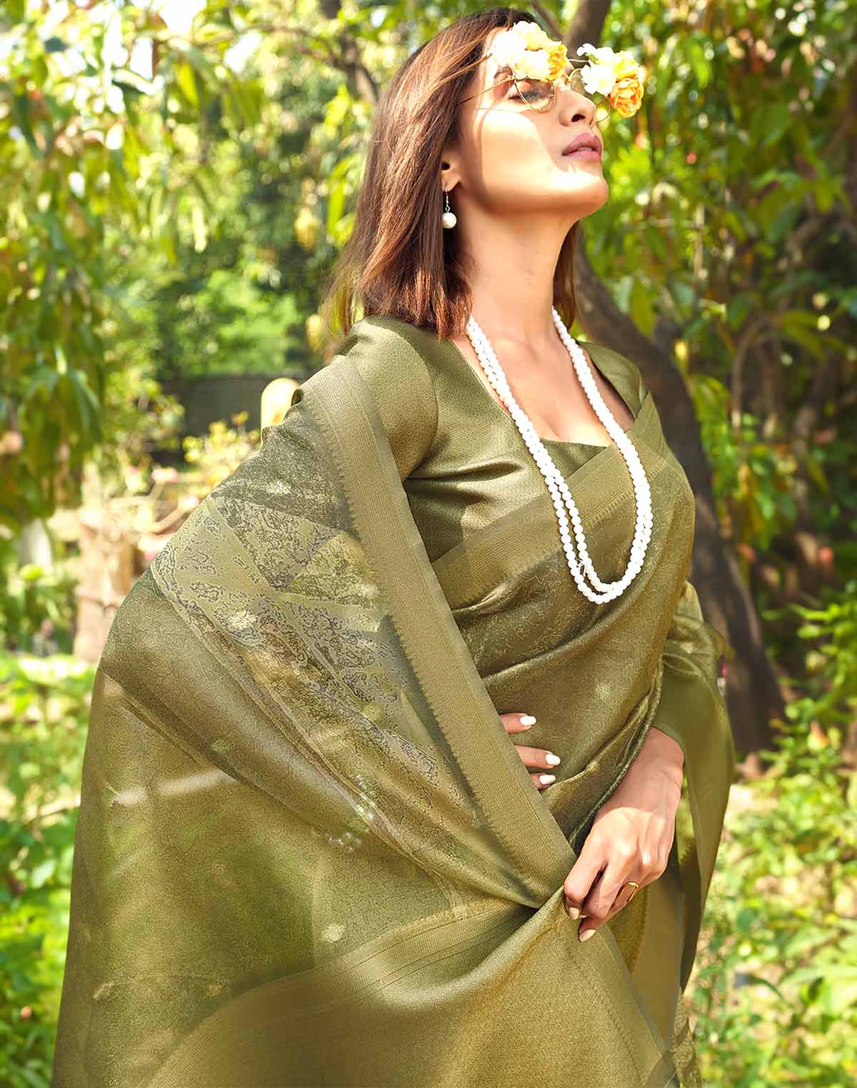 Collection of Adorable Green Organza Designer Saree in a gallery layout