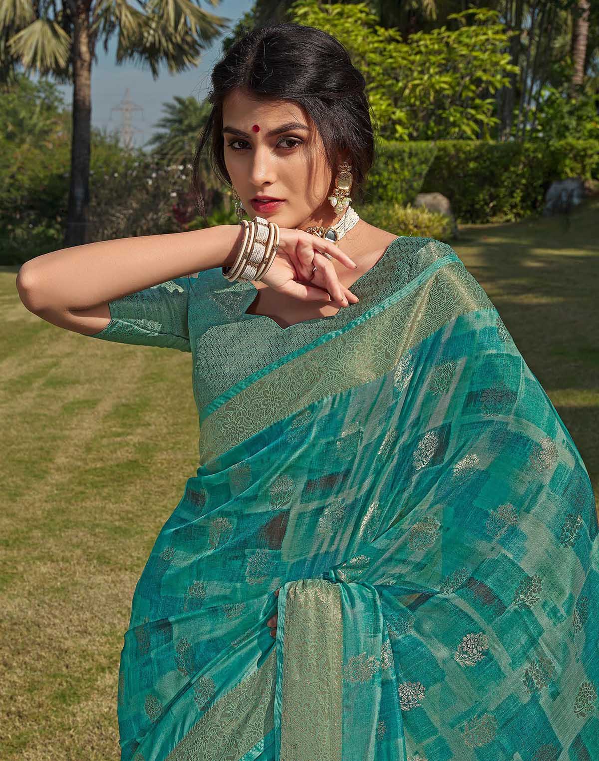 Collection of Sea Green Floral bunches Soft Silk Saree in a gallery layout