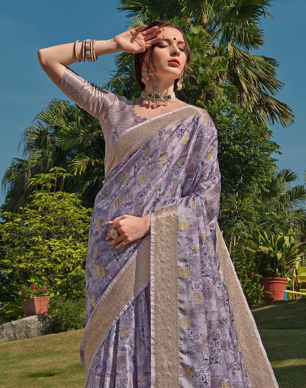 Collection of Light Purple Coloured Floral Soft Silk Saree in a gallery layout