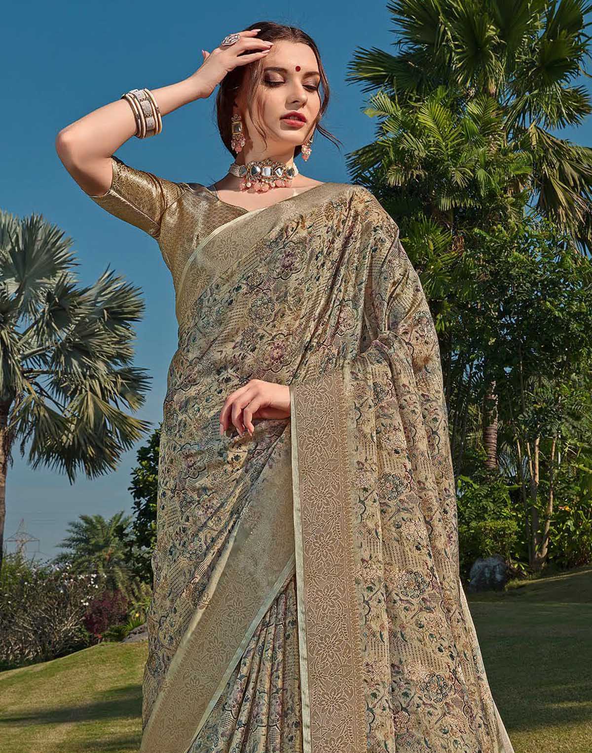 Collection of Beige Coloured Soft Silk Floral Pattern Saree in a gallery layout