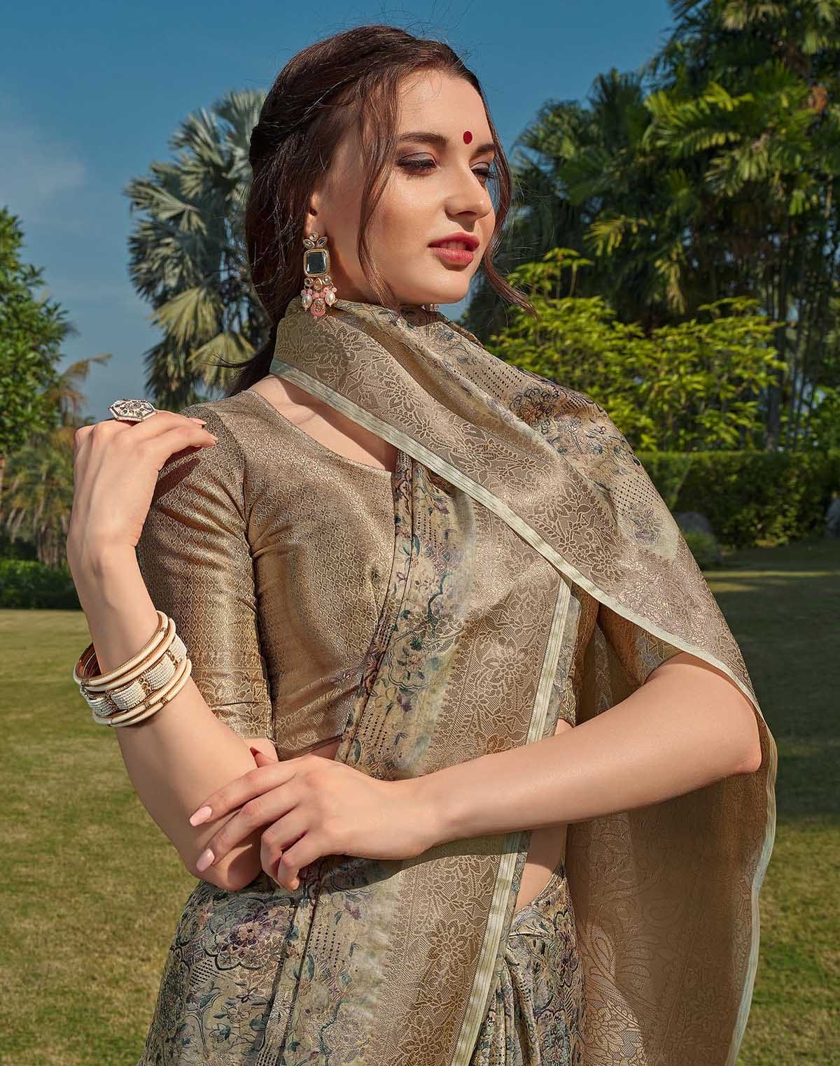 Collection of Beige Coloured Soft Silk Floral Pattern Saree in a gallery layout