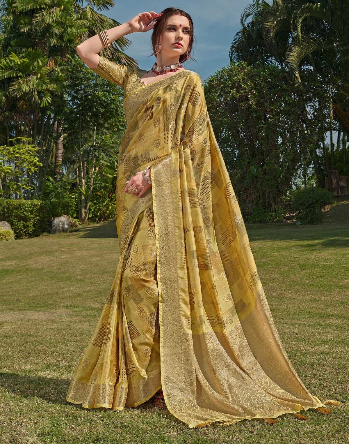 Collection of Mustard Floral Soft Silk Fancy Saree in a gallery layout