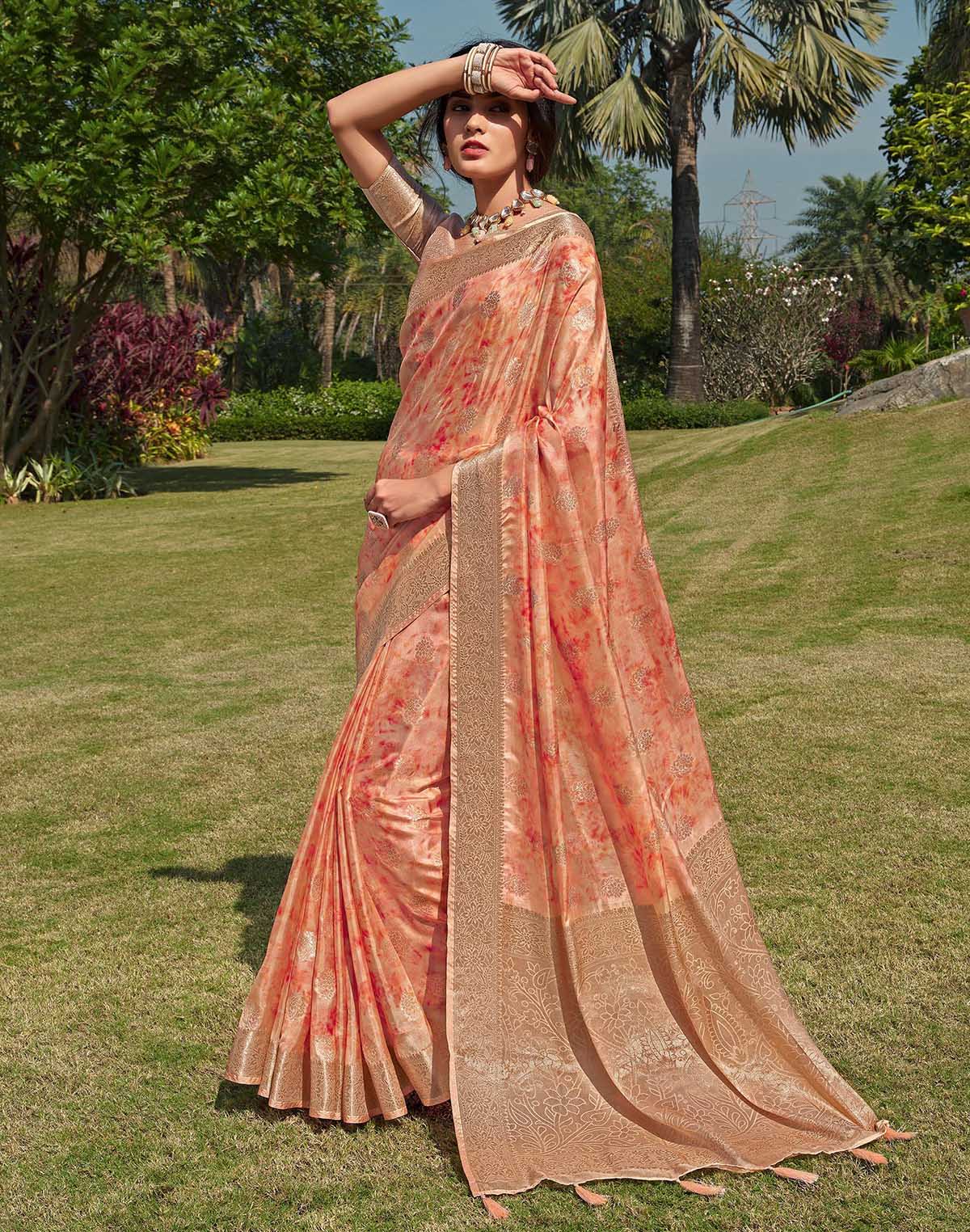 Collection of Floral Pattern Orange Colour Soft Silk Saree in a gallery layout