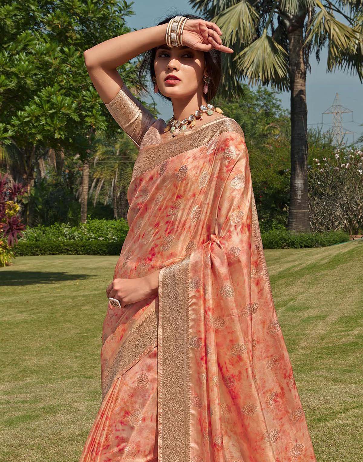 Collection of Floral Pattern Orange Colour Soft Silk Saree in a gallery layout